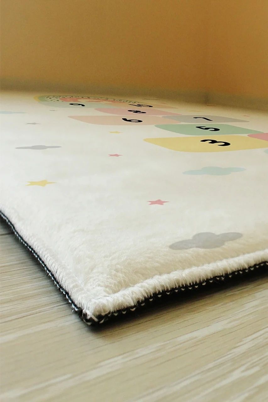 Плюшевий утеплений дитячий килим "Зірки на сірому"