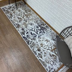 Турецький килим у спальню з бахромою
